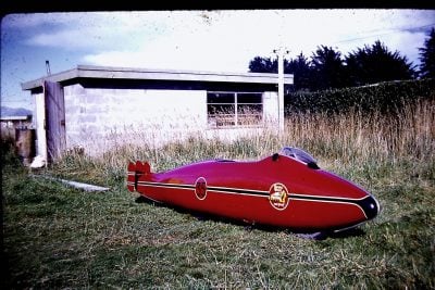 Burt Munro Indian streamliner outside his garage