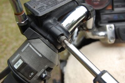 Lidlox Magna step 1: Installation on the Magna—step one, spin out the top U-clamp bolt.