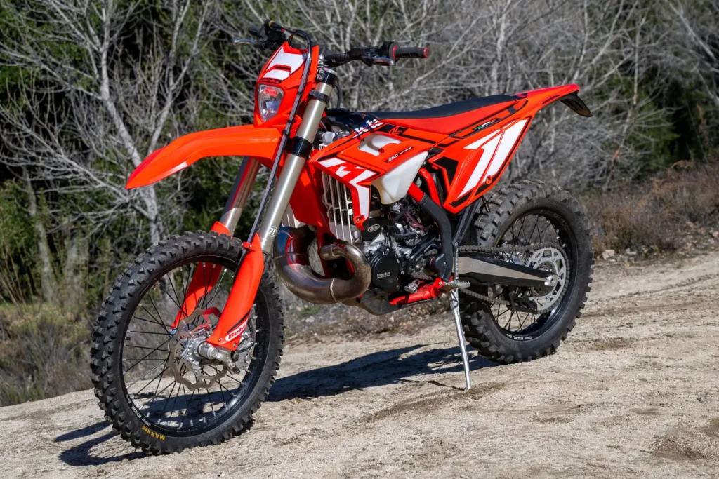 2024 Beta 250 RR parked on a dirt trail, front three-quarter view