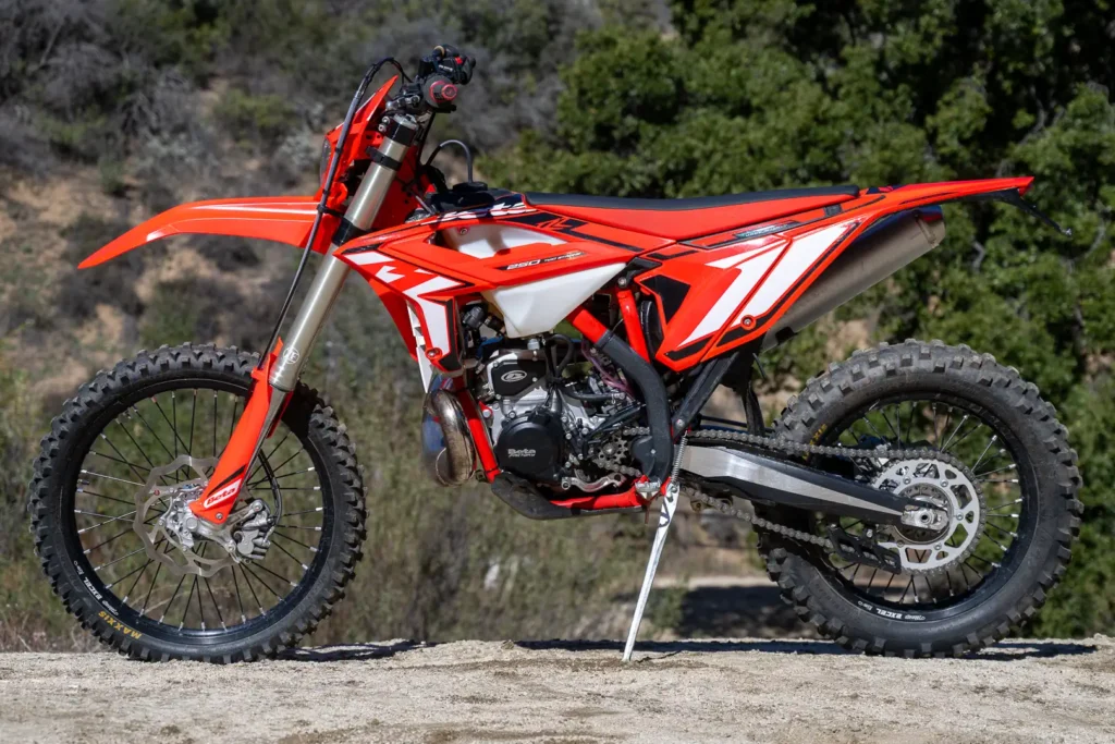 2024 Beta 250 RR parked on a dirt trail, right side view