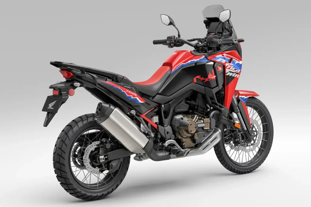 2024 Honda Africa Twin DCT right rear three-quarter view showing muffler