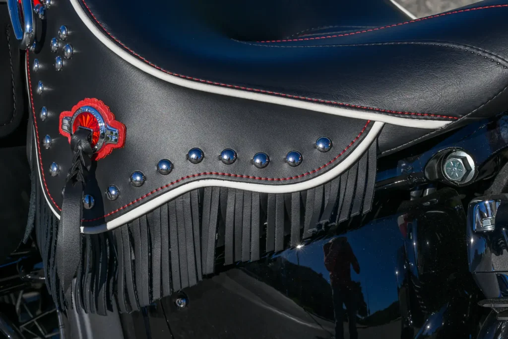 2024 Harley-Davidson Hydra-Glide Revival saddlebag with leather fringe, studs, and conchos
