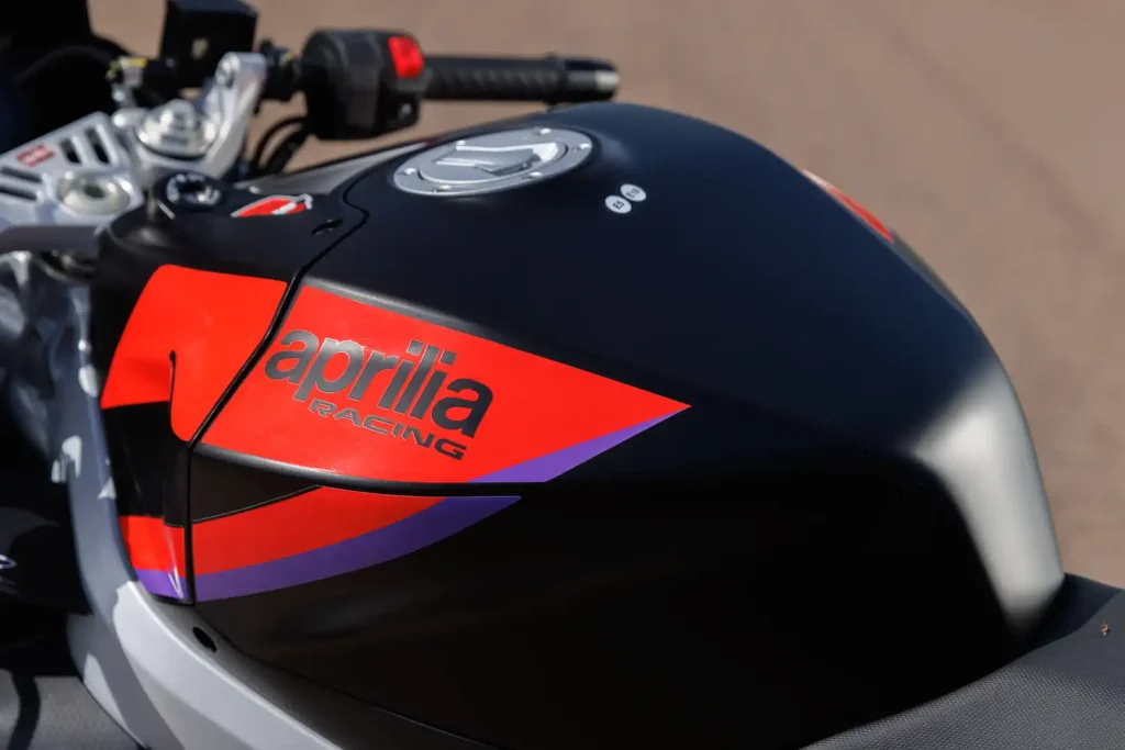 2024 Aprilia RS 457 fuel tank detail in the Racing Stripes livery