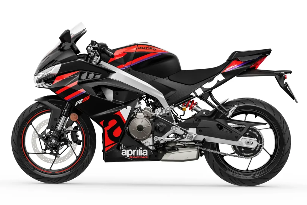 2024 Aprilia RS 457 in the black and red Racing Stripes livery, right side studio view