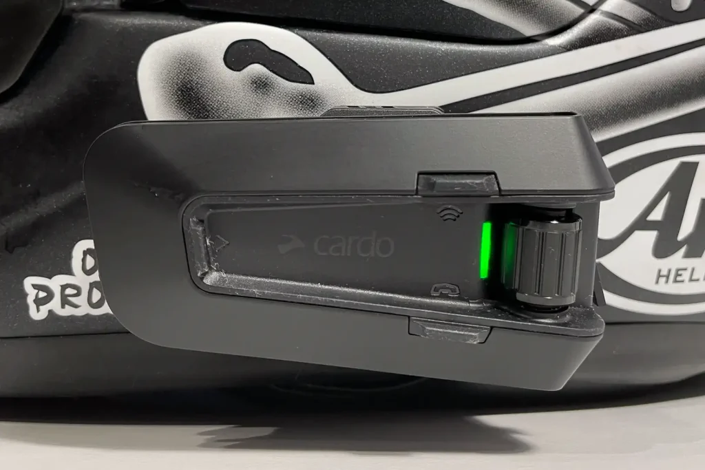 Cardo Mesh Boost Doubles Packtalk Group Size to 31 Riders: Packtalk Pro installed on Arai helmet