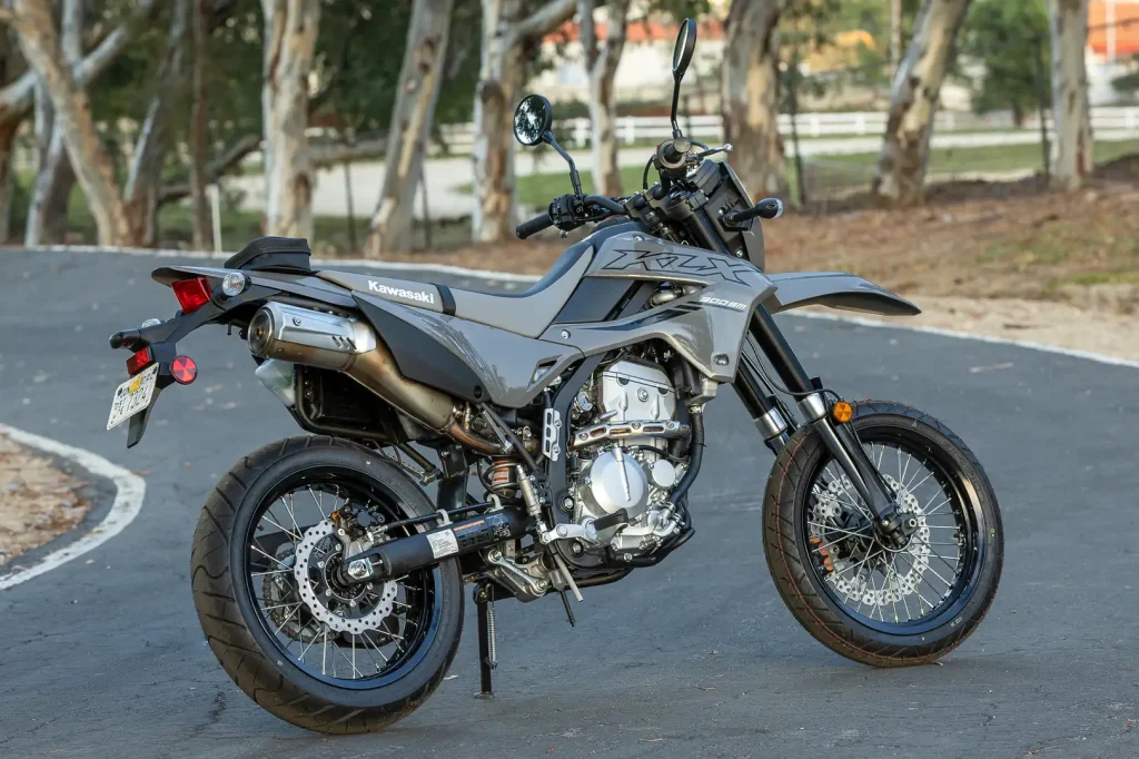2024 Kawasaki KLX300SM parked, rear three-quarter view