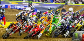 2027 AMA Supercross and Motocross Rider Numbers: SMX, Too! Riders in the first turn at a supercross race.