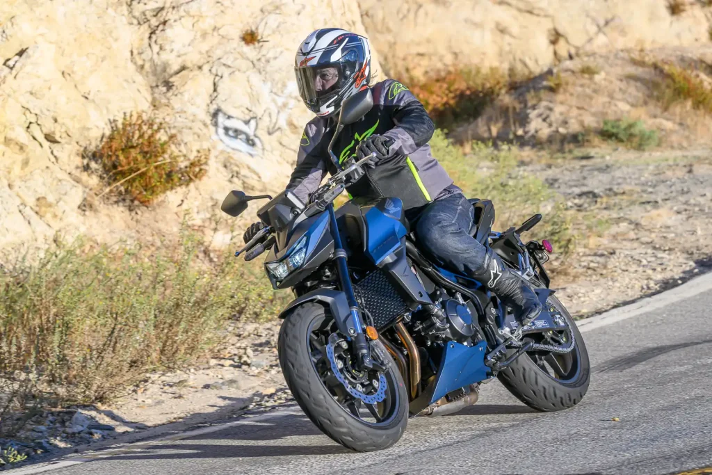 Riding a motorcycle through a canyon