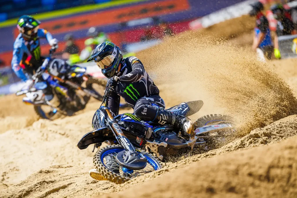 Haiden Deegan leads Cooper Webb through the sand in an SMX race.