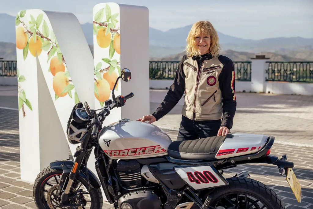 Associated Editor Kelly Callan posing in Spain with the Triumph Tracker 400