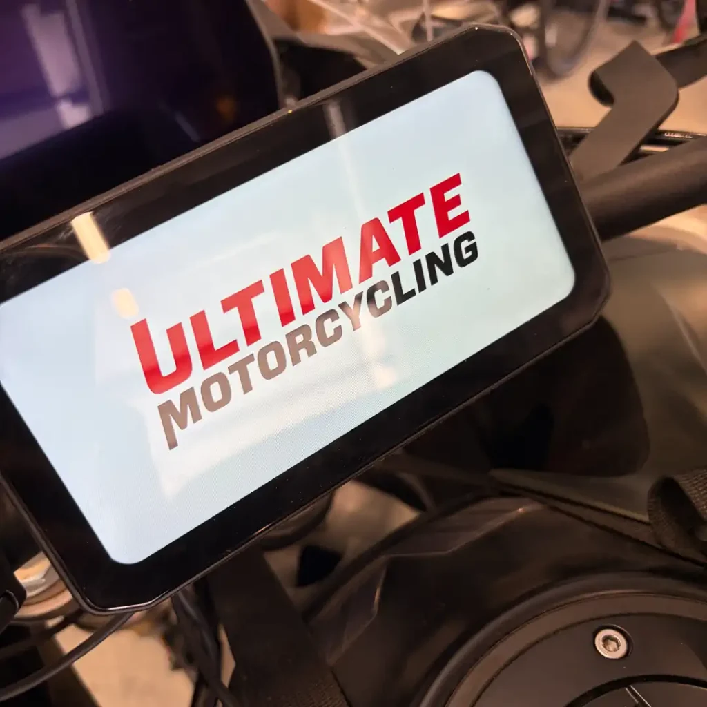 CPMC X6 startup screen with Ultimate Motorcycling logo