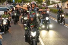 Italian Bike Week 2026 parade of motorcycles with an exuberant passenger