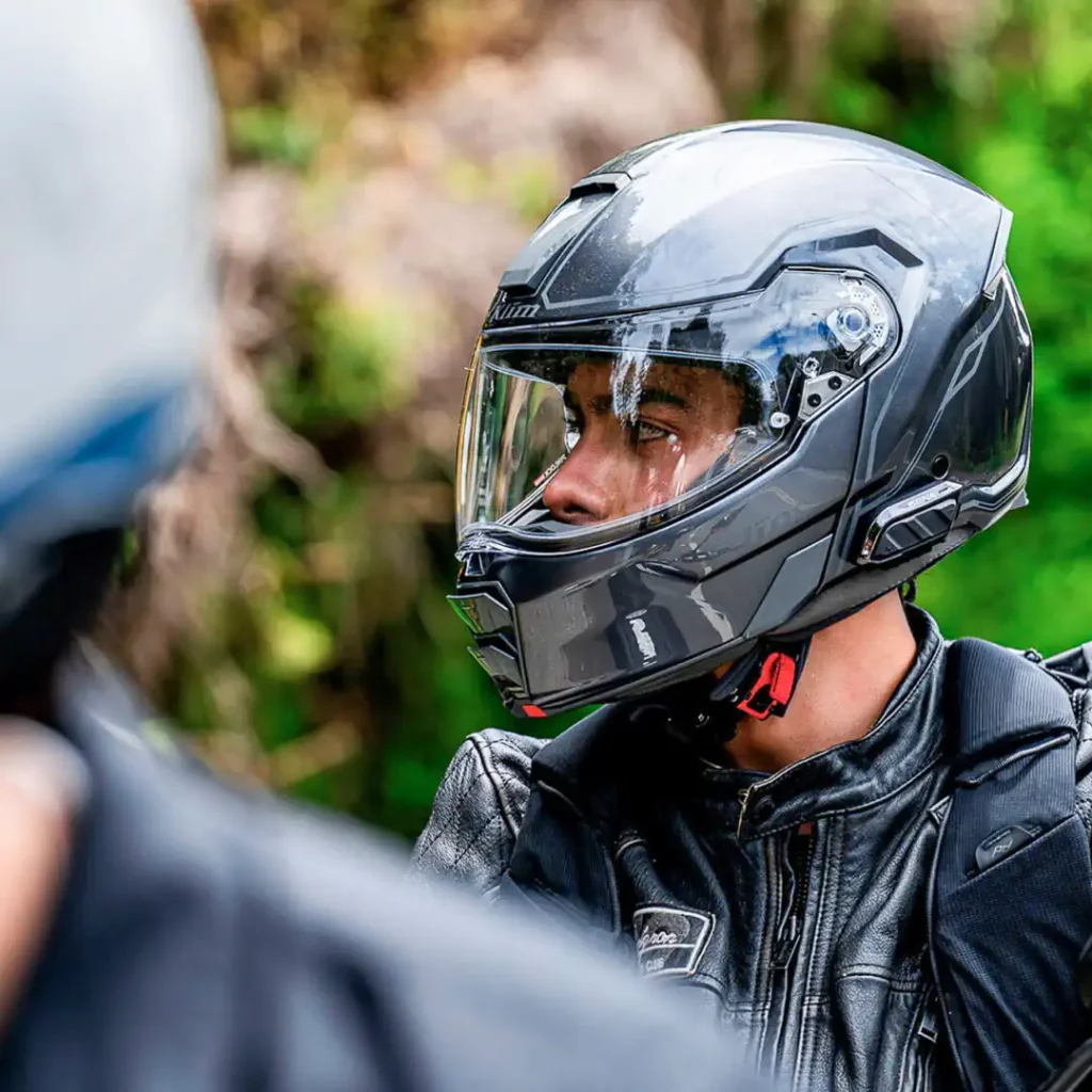 Two riders in helmets