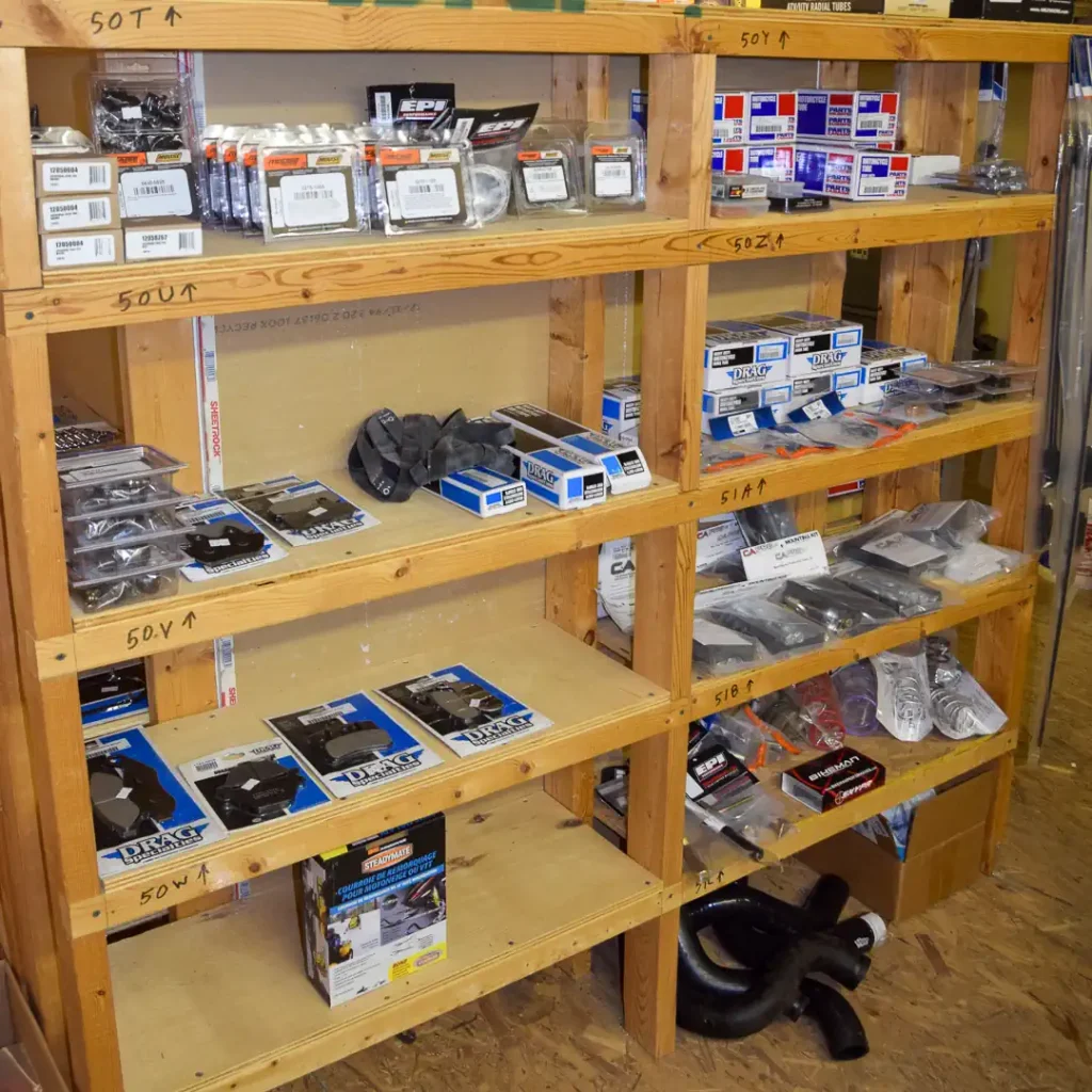 Shelves of motorcycle parts for sale to customers.