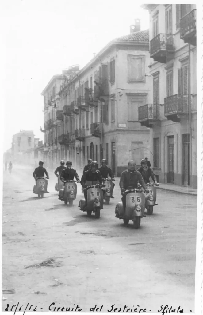 Scooters in the street during the 1952 Vespa Rally.