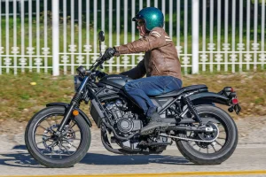 Left side of a leaned over 2026 Honda SCL500