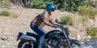 2026 Honda SCL500 Review: A Scrambler Time Machine 2026 Honda SCL500 Review: Scrambler motorcycle crossing a stream