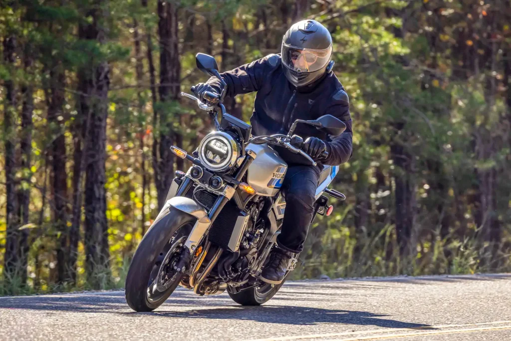 2026 Honda CB1000F leaned over in a rural setting