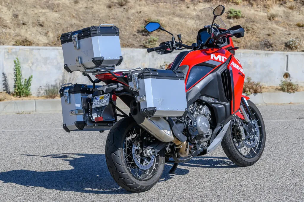 Rear right 3/4 view of the 2026 Moto Morini X-Cape 1200 with aluminum cases.