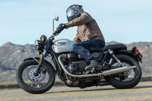 2026 Triumph Bonneville T100 leaned to the right through a turn.