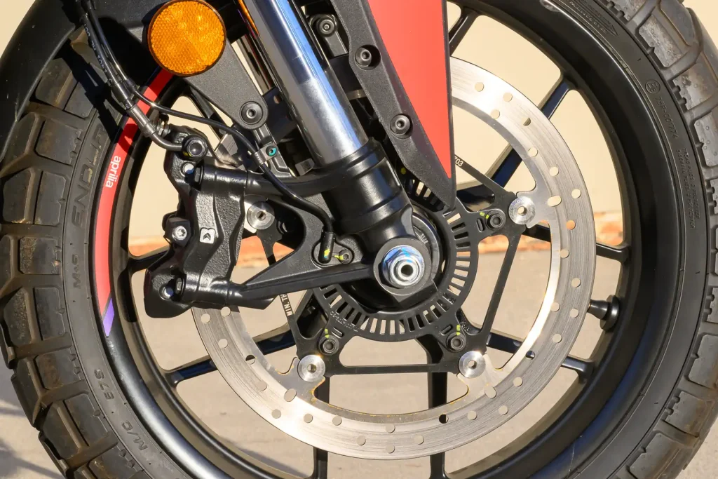 Radial-mount Bybre four-piston caliper and 300mm disc.