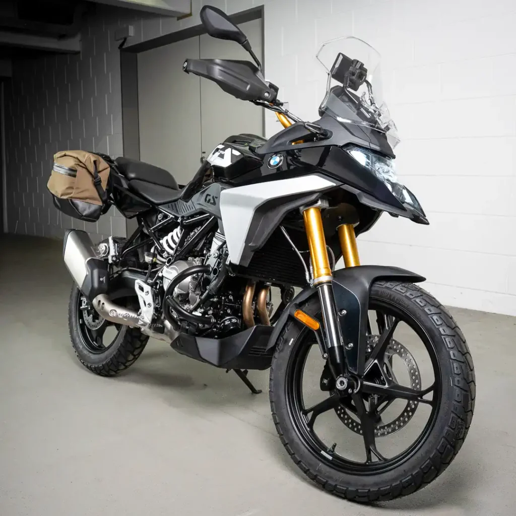 2027 BMW F 450 GS First Look: 3/4 front right view in studio of black standard version