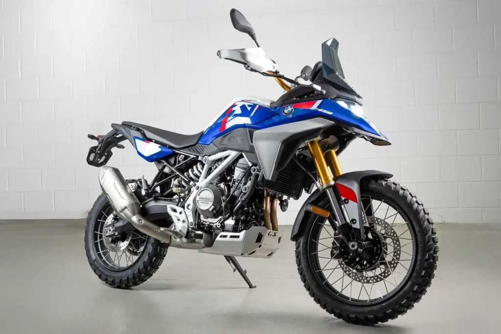 2027 BMW F 450 GS First Look: 3/4 right side front in a studio. Trophy edition