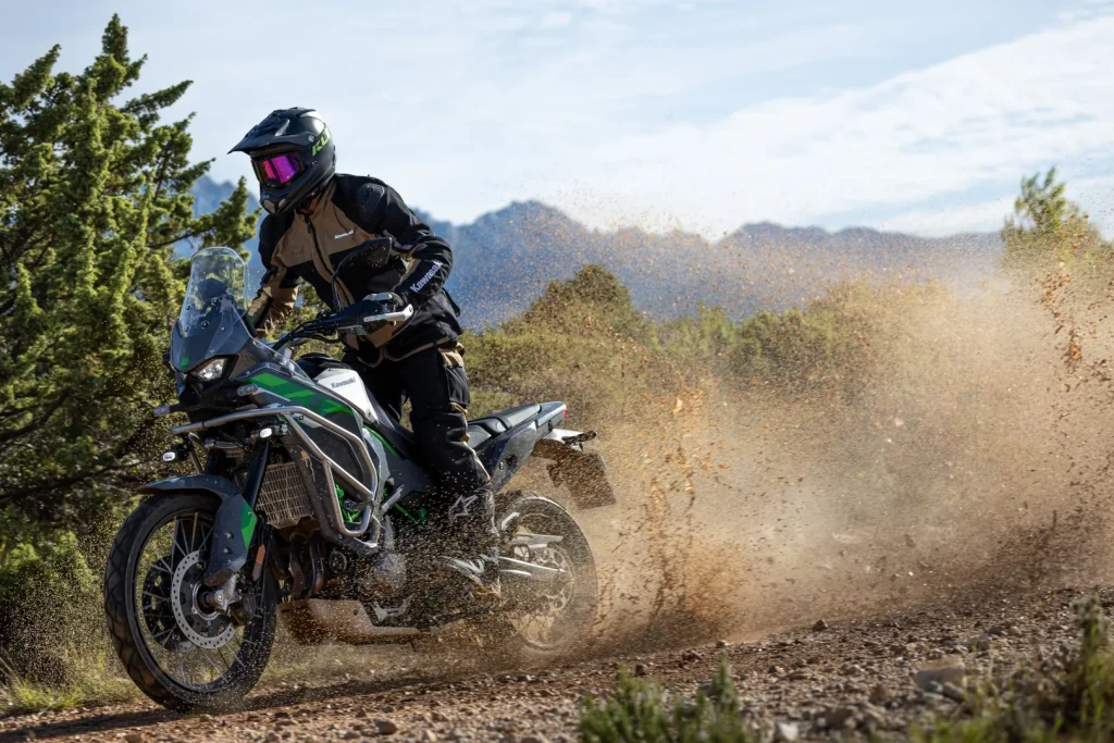KLE650 SE kicking up dust on an off-road trail