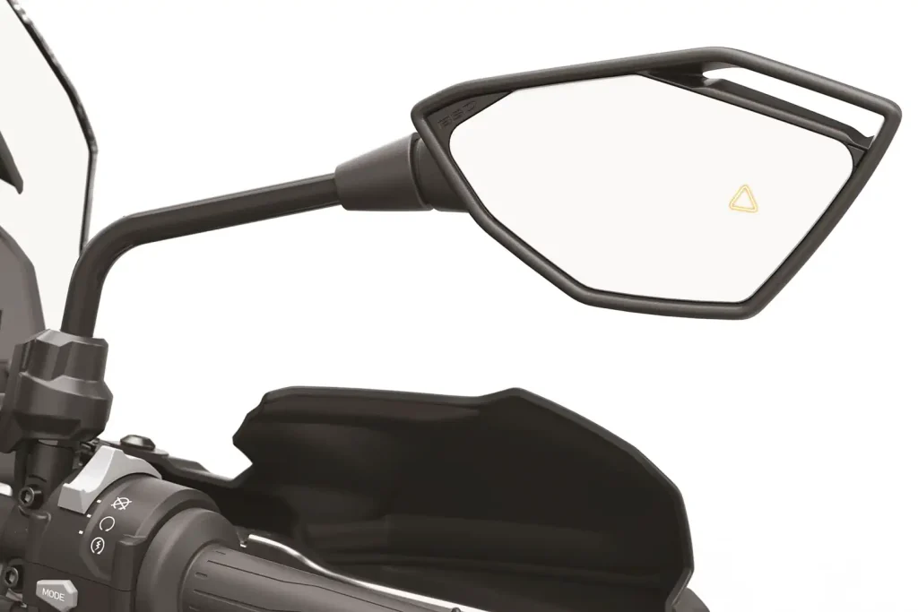 Blind spot monitoring shows in a rear view mirror