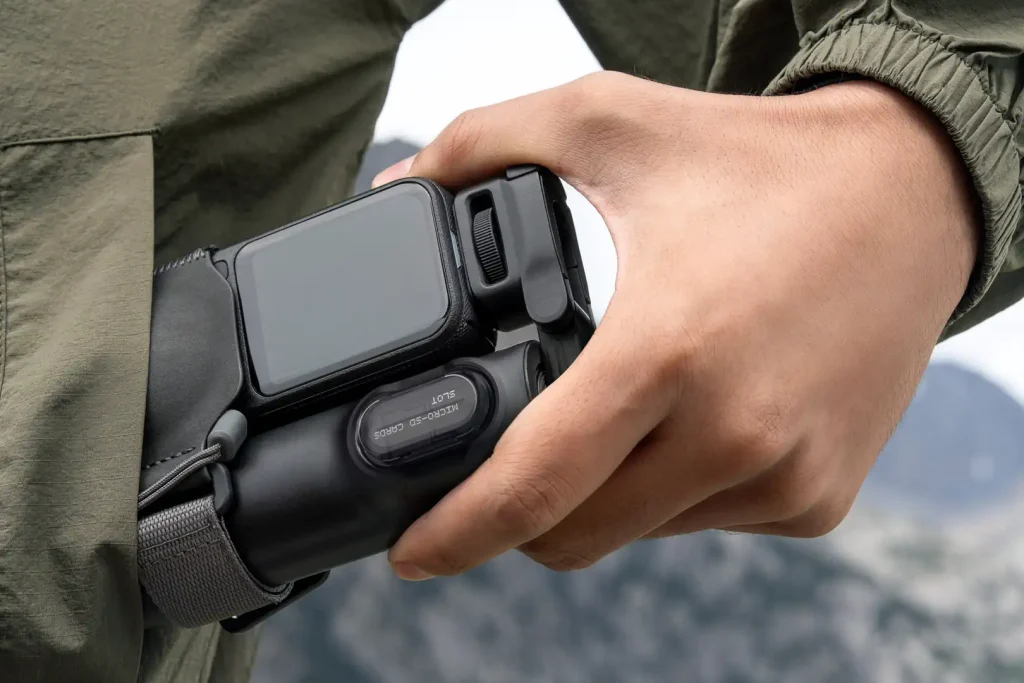 Insta360 X6 being pulled out of a pocket