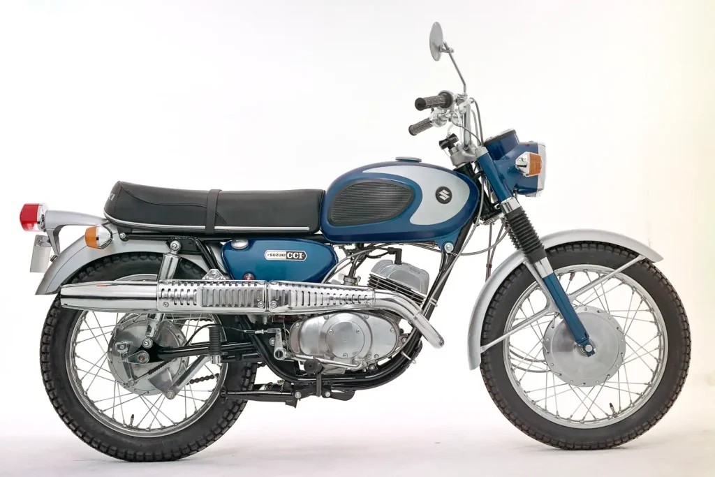 Right side of the 1967 Suzuki Scrambler TC250 in a studio.