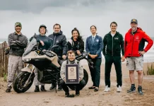 Zero DS Sets Guinness Record: 271 Miles on a Single Charge Zero Motorcycles' Guinness World Record Setting Team posing with an electric motorcycle