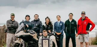 Zero DS Sets Guinness Record: 271 Miles on a Single Charge Zero Motorcycles' Guinness World Record Setting Team posing with an electric motorcycle