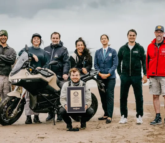 Zero DS Sets Guinness Record: 271 Miles on a Single Charge Zero Motorcycles' Guinness World Record Setting Team posing with an electric motorcycle